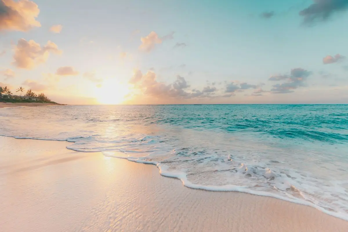 Sandy beach and blue water